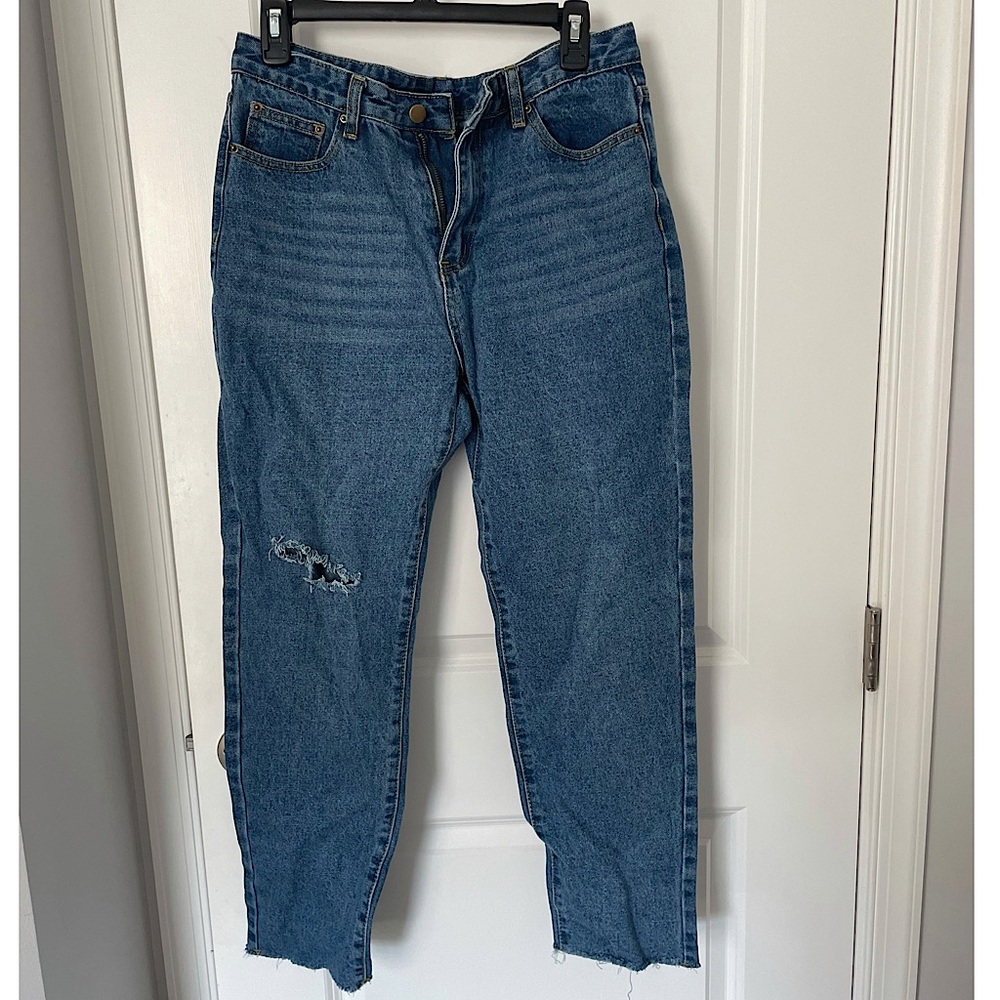 Shein ripped mom jeans. Size L (8/10). Purposefully destroyed hems. NEVER WORN.